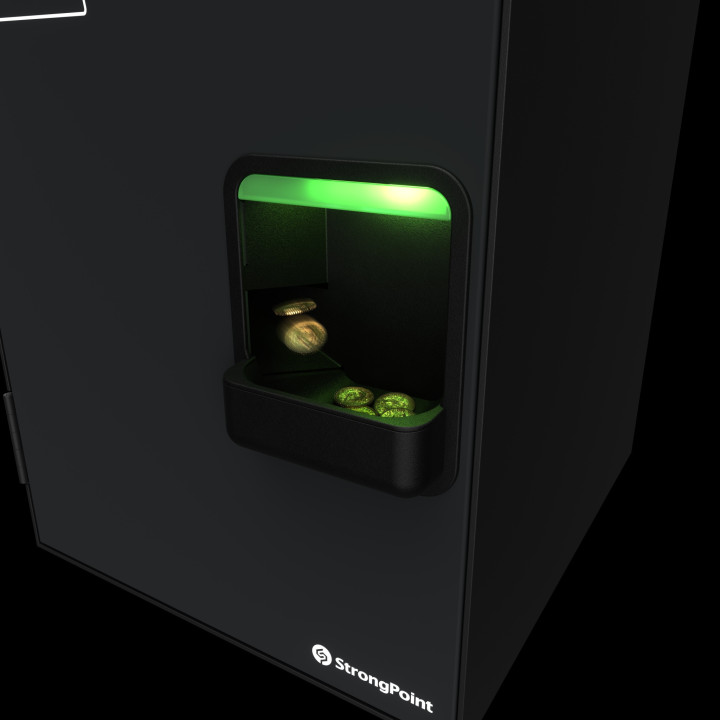 Gros plan sur le bac de récupération d'une borne de paiement automatique Cashguard Uni