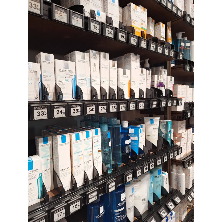Vue dans un rayon de crèmes du Séparateur de rayon sécable HL DISPLAY - OPT-AVD60B+ en noir